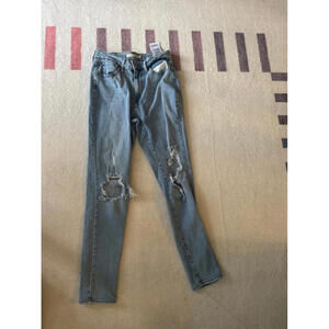 Levi’s 721 high rise skinny size 27 medium wash destroyed jeans